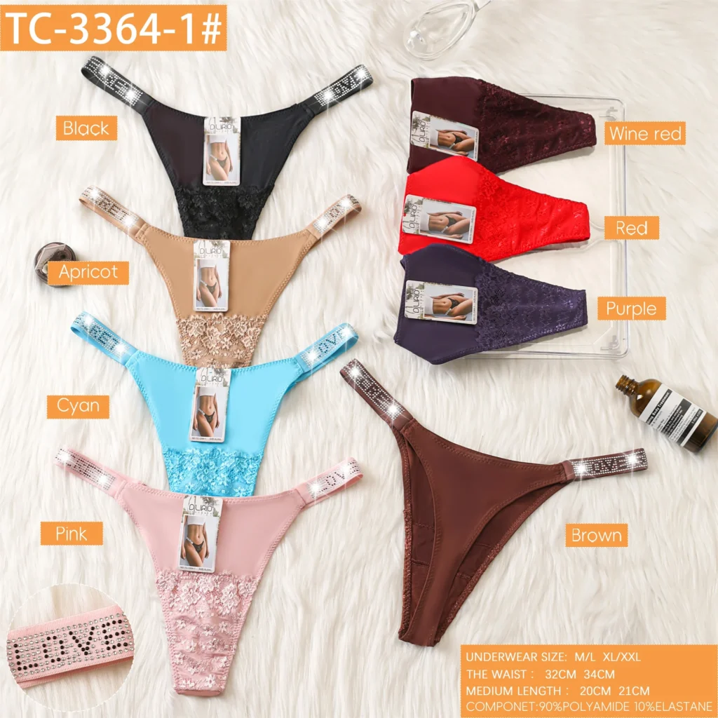 Eight colourways of the rhinestone-strap lace-trim thong TC-3364-1 in polyamide microfibre