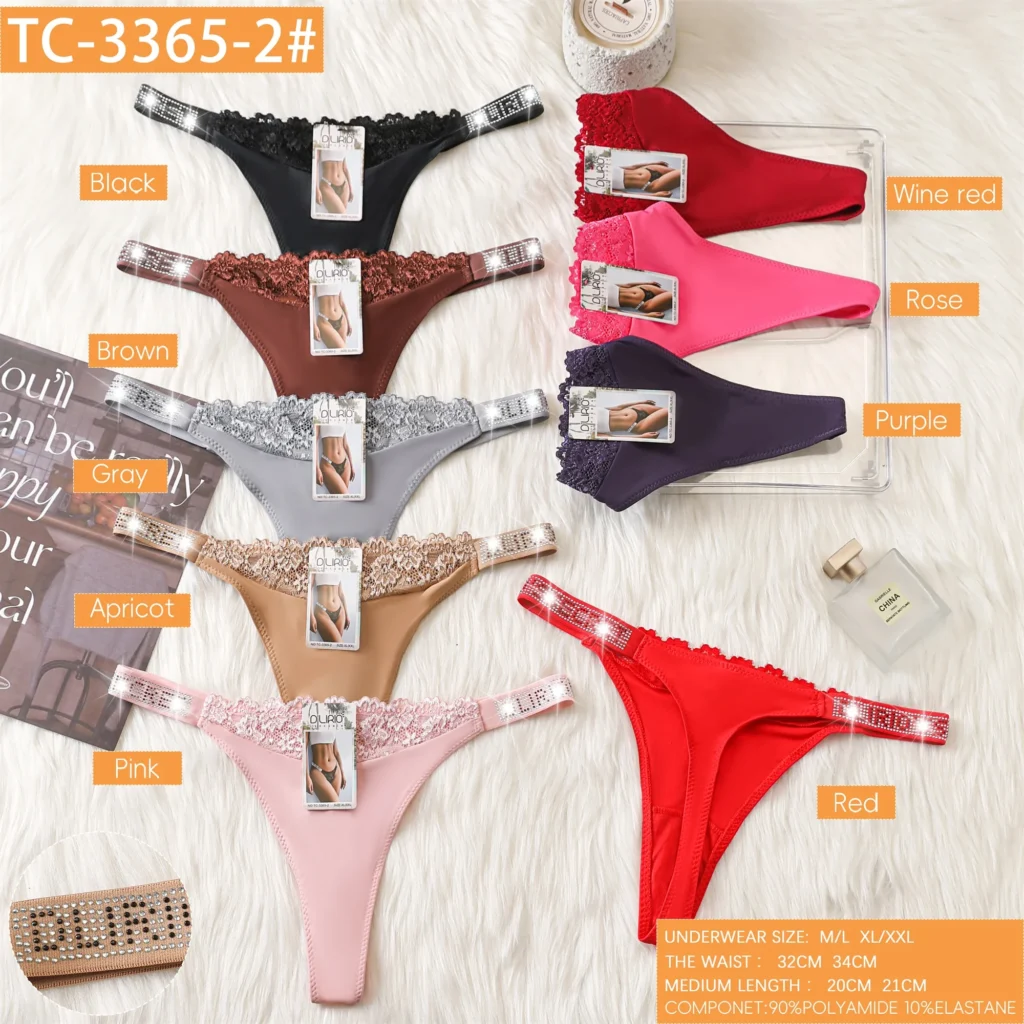 Nine colourways of the lace-edge microfibre thong TC-3365-2 with rhinestone side straps