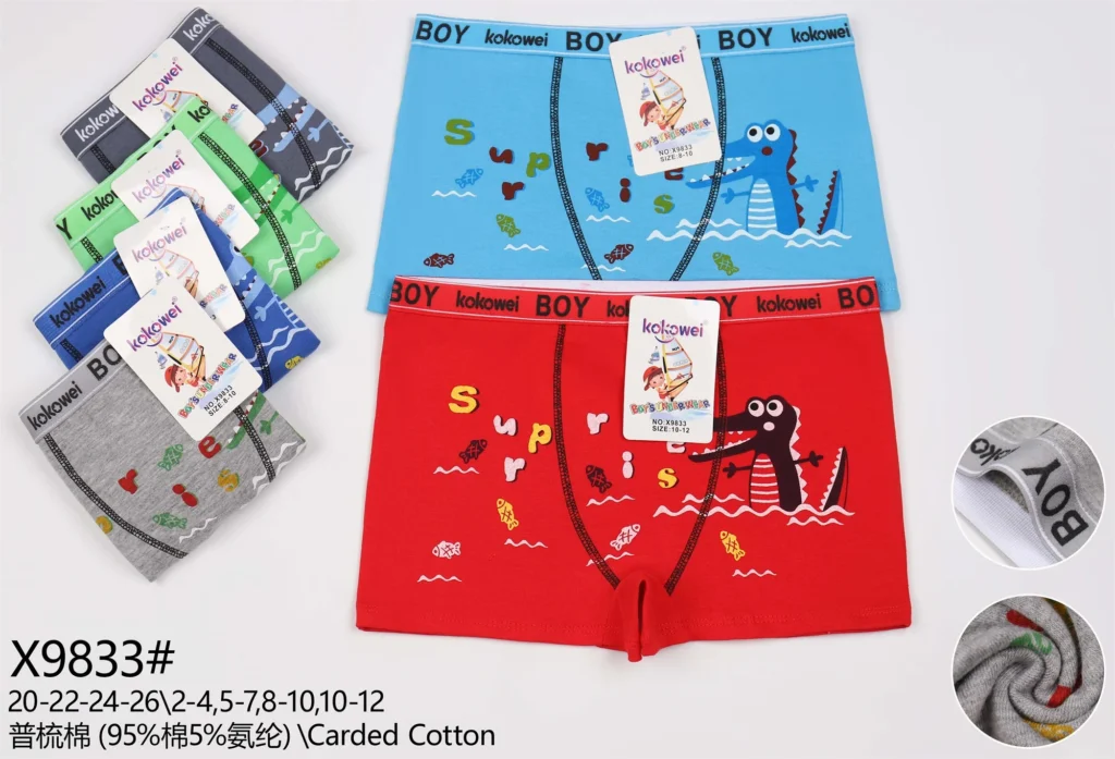 Boys' cotton boxer brief X9833 with a crocodile and Surprise print, shown in five colours