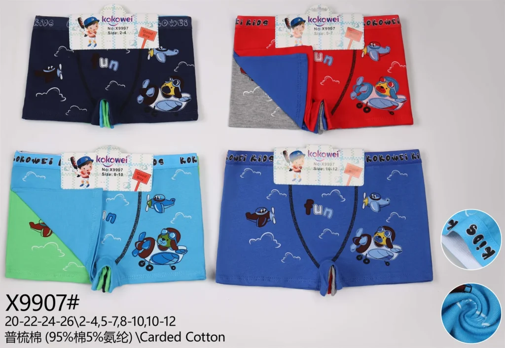 Boys' cotton boxer brief X9907 with cartoon planes and a Fun print, shown in five colours