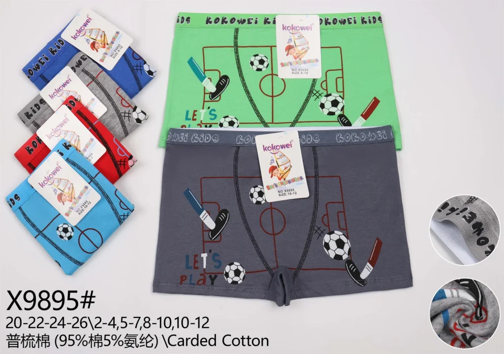 Boys' cotton boxer brief X9895 with a football pitch and Let's Play print, shown in six colours