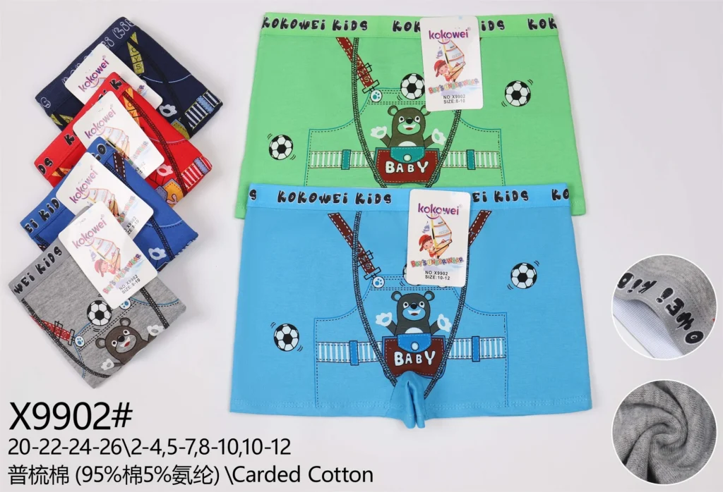 Boys' cotton boxer brief X9902 with a bear in dungarees and footballs, shown in six colours