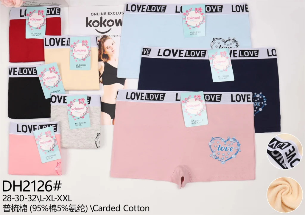 Girls' cotton boyshort DH2126 with a LOVE jacquard waistband and a daisy heart motif, shown in seven colours
