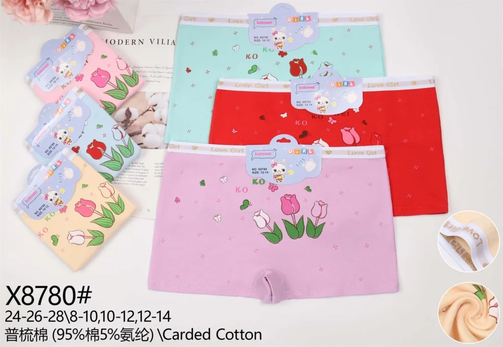 Girls' cotton boyshort X8780 with a tulip and butterfly print and a Love Girl waistband, shown in six colours