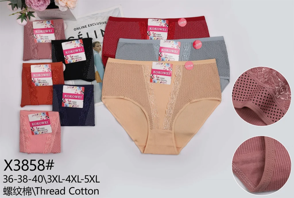 Plus-size rib-knit brief X3858 with a pointelle mesh front and a lace centre stripe, shown in seven colours