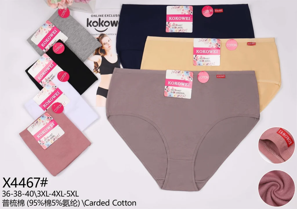 Plus-size plain cotton brief X4467 with a woven side label, shown in seven colours