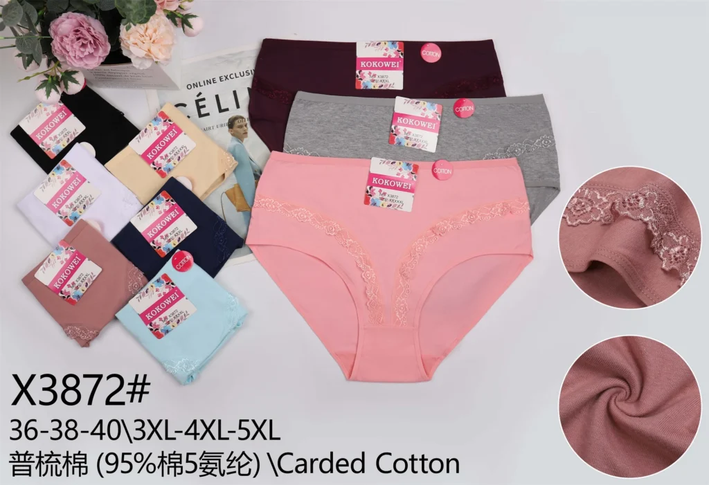 Plus-size cotton brief X3872 with a lace V trim at the front, shown in seven colours