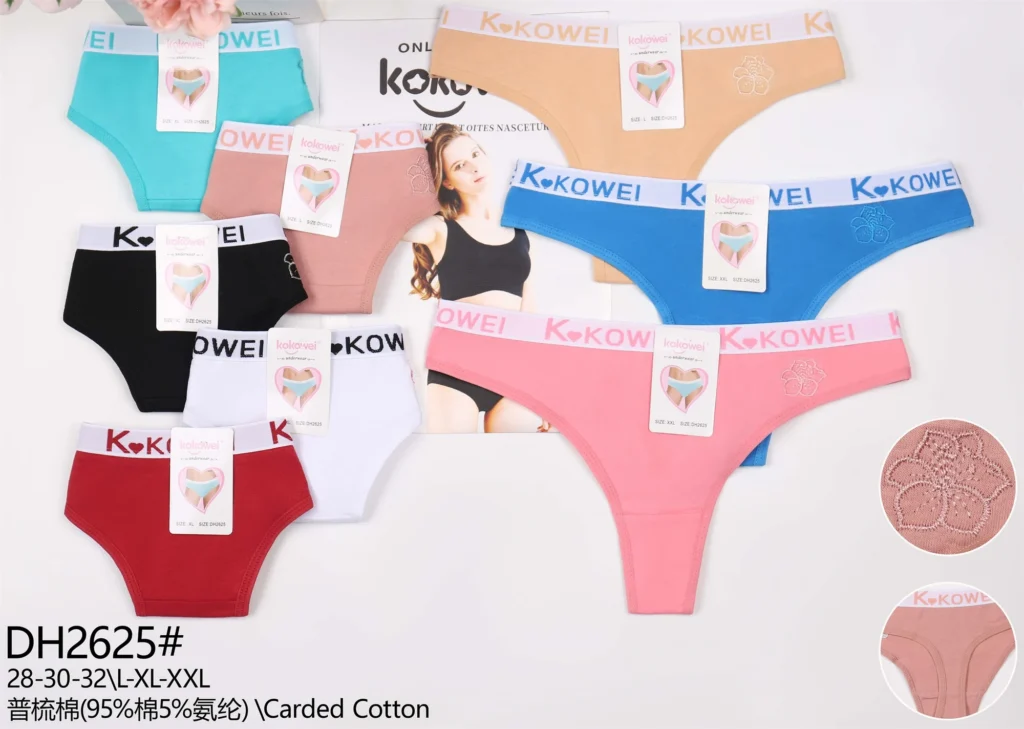 Women's cotton thong DH2625 with a heart-logo jacquard band and a hip embroidery, shown in seven colours