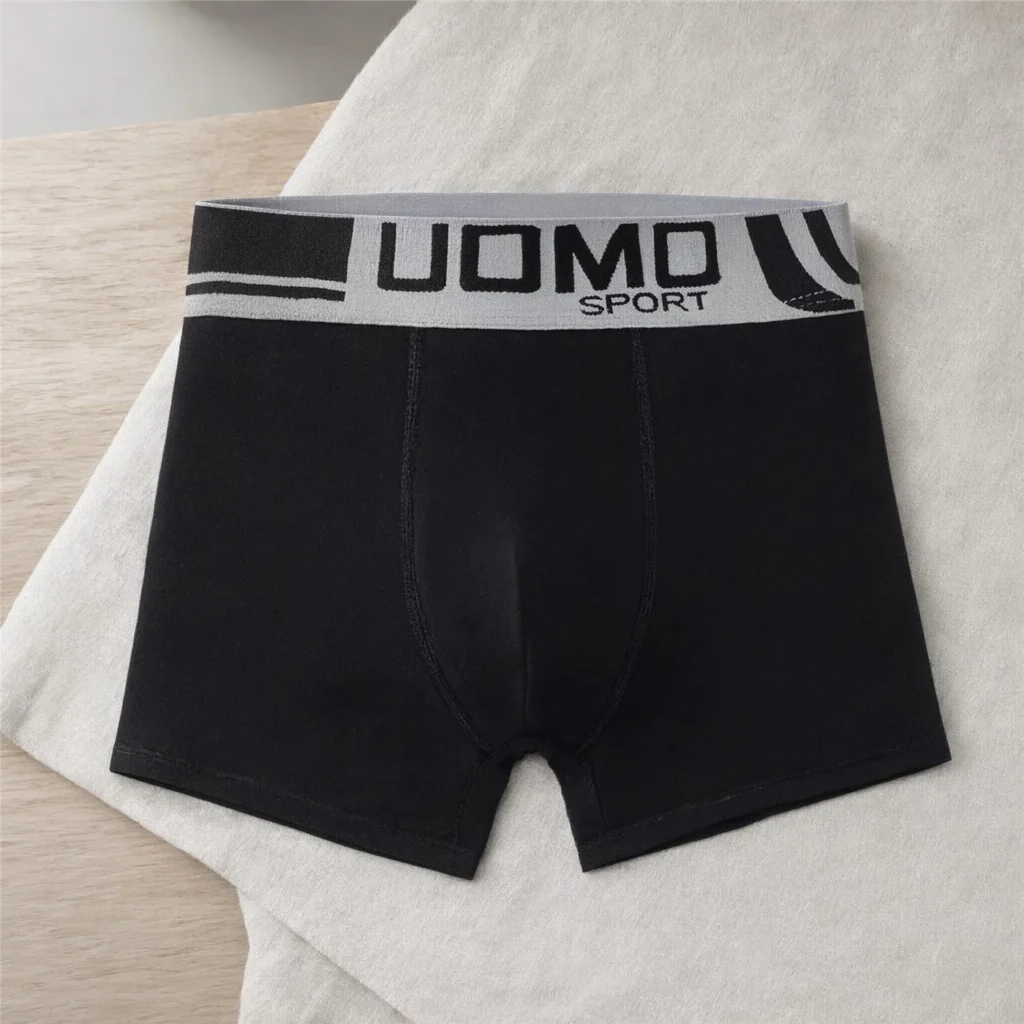 GMUO-7076B boxer brief laid flat, showing the pouch seam and cover-stitched leg hem