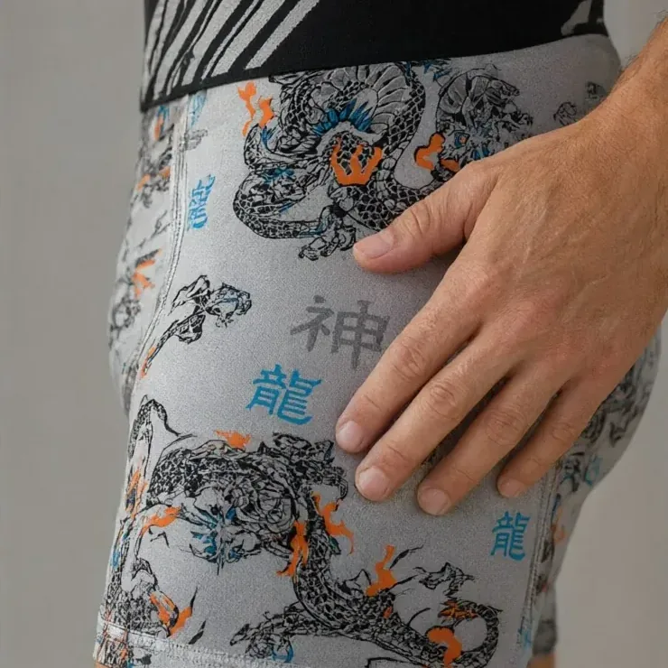 Dragon print on the GMUO-7375AMH boxer brief seen at the hip, with the dragon, flame and kanji motifs at wearing scale