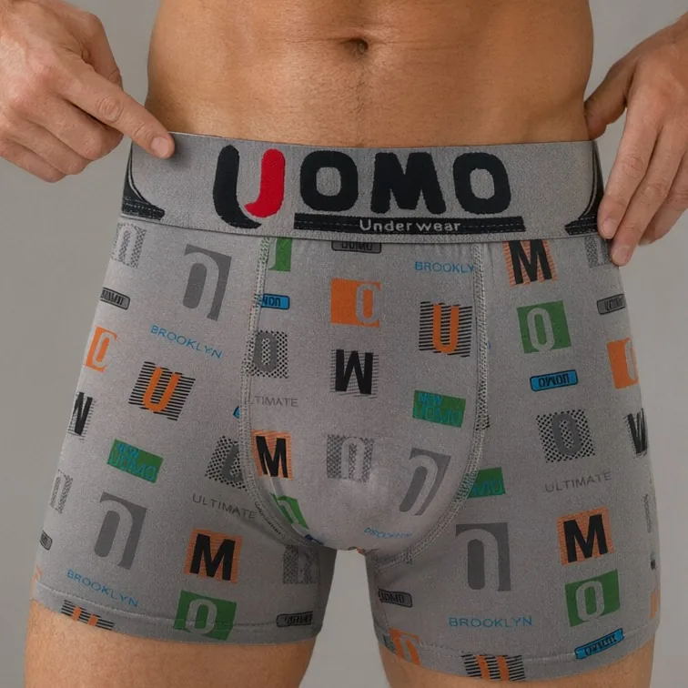 GMUO-7535AMH letter-print boxer brief in grey, front view with the UOMO waistband held out