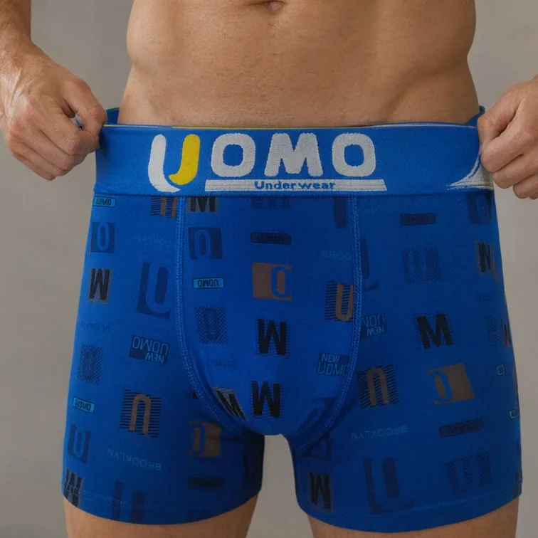 GMUO-7535AMH letter-print boxer brief in royal blue, front view with the waistband held out